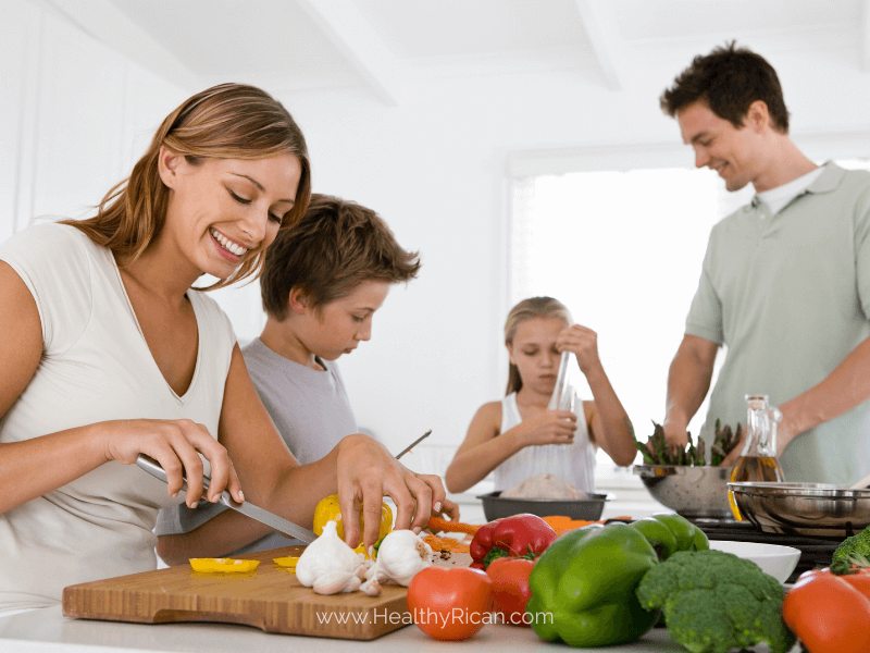 Happy family enjoying a self-care day together with simple activities like yoga, reading, and relaxing outdoors, promoting well-being and togetherness.