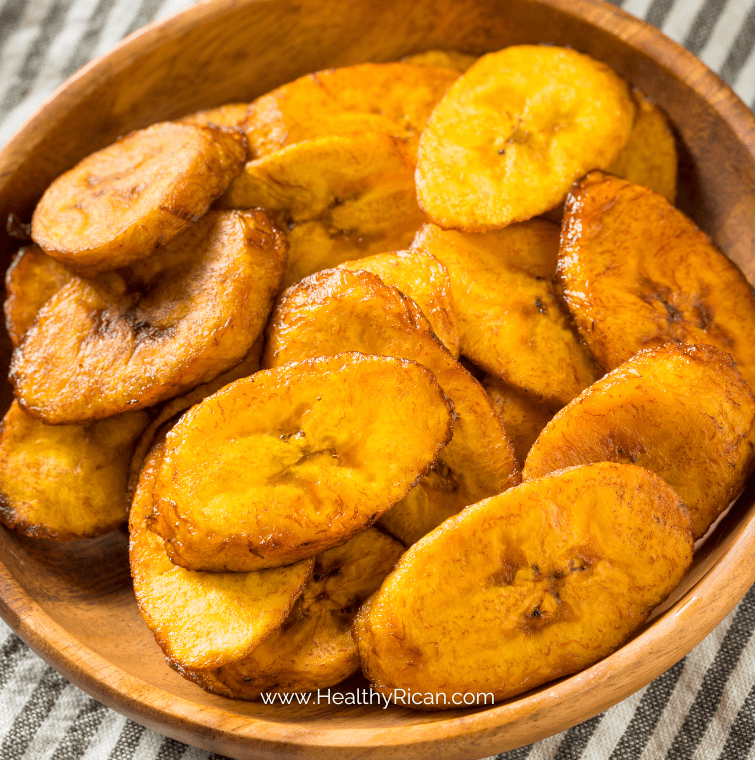 A bowl of golden fried ripe plantains, a delicious and healthy Puerto Rican recipe that showcases the natural sweetness of plantains. These maduros are a perfect side dish or snack, offering the authentic flavors of Puerto Rican cuisine. Learn how to make this classic Puerto Rican recipe!